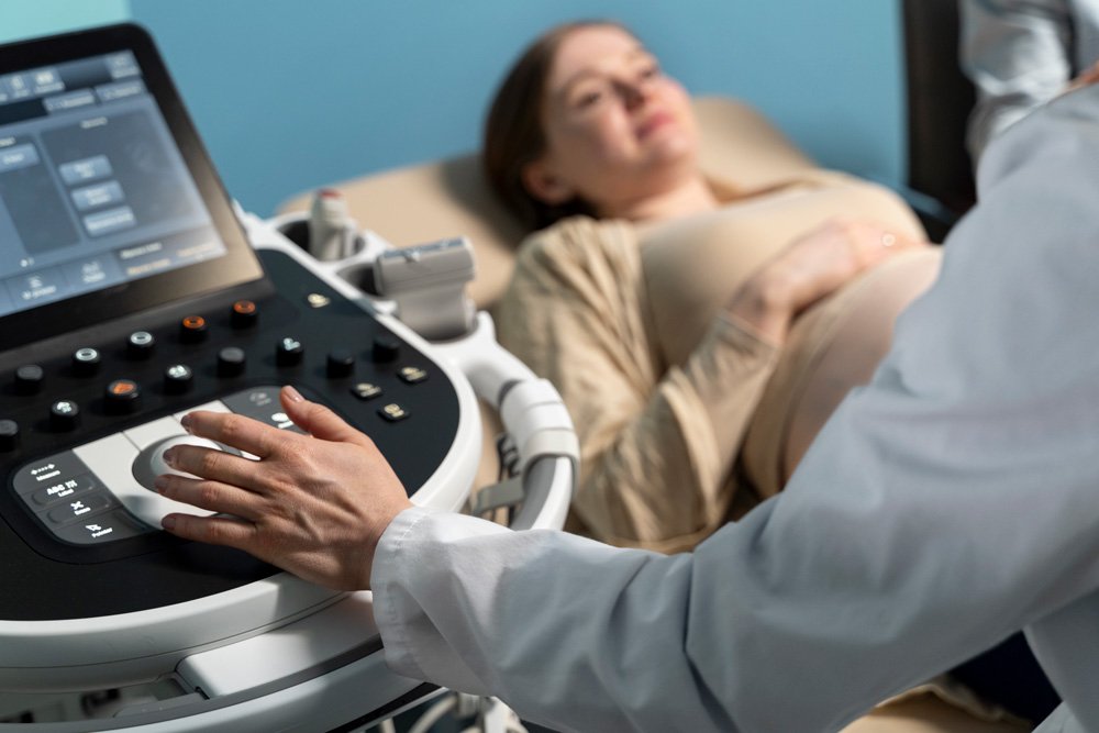 gynecologist performing ultrasound consultation in vapi